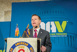 Dr. Paul Lawrence at podium VA Under Secretary for Benefits