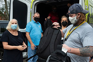 people standing Homeless Stand Down Image