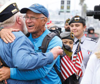 William Shuttleworth hugging veteran William Shuttleworth